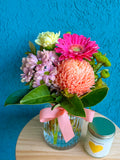 The Flower Fix- Jar of Blooms with a Candle